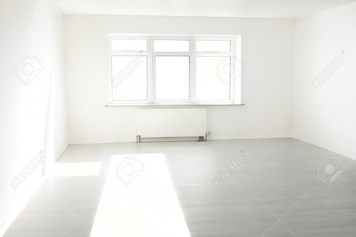 White room with window full of light
