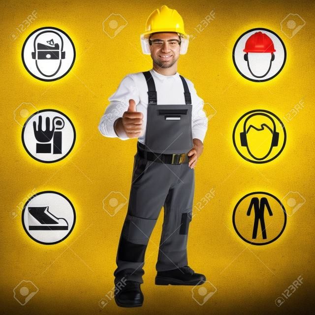 Man dressed in work clothes, and safety at work signs