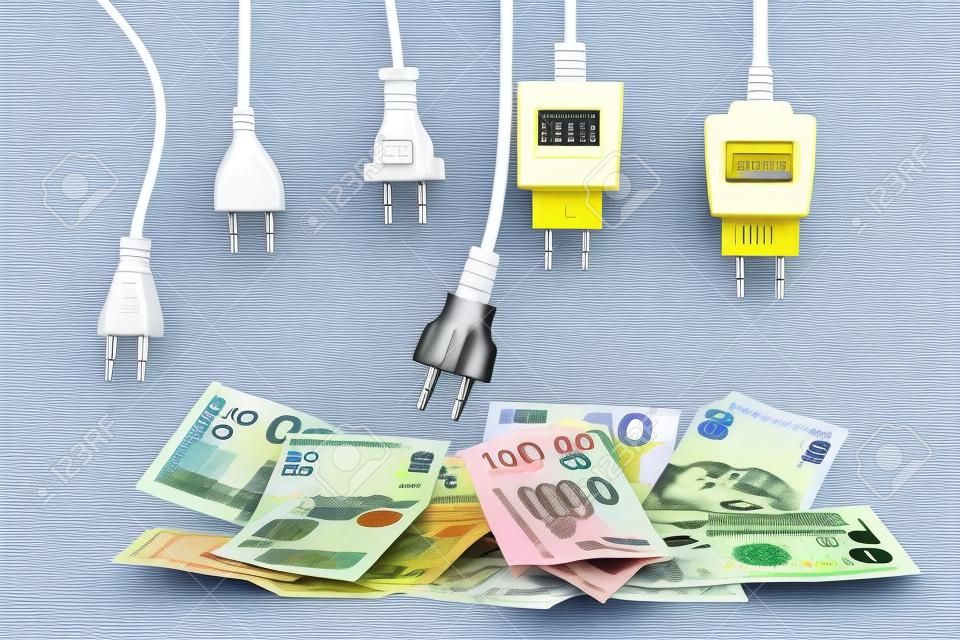 Zasilacz elektryczny przewody zasilające kable z wtyczkami nad stosem rachunków za banknoty euro. efektywność energetyczna, zużycie energii, koszt energii elektrycznej i droga koncepcja energetyczna