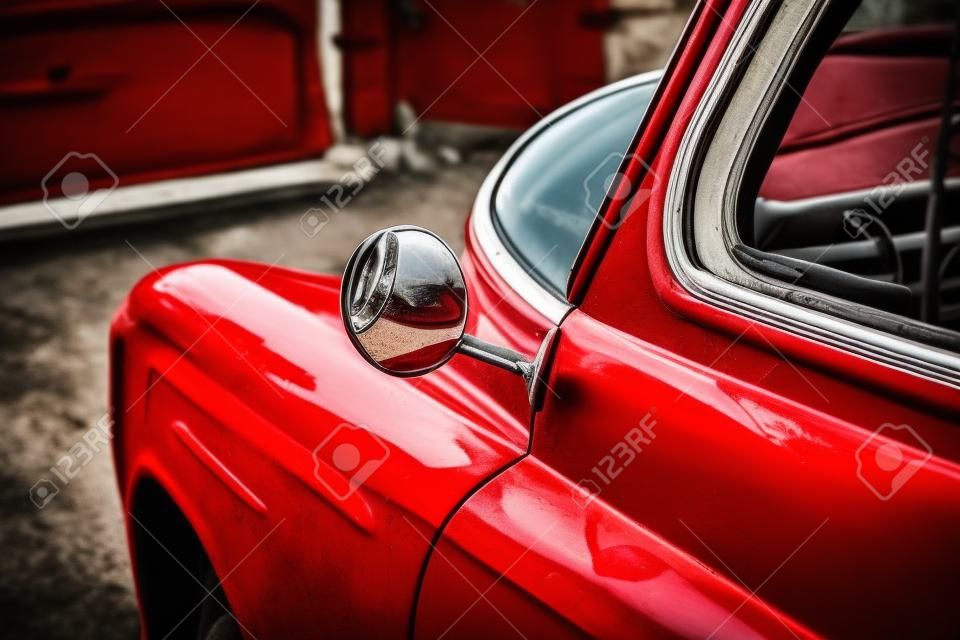 The red door of an old Soviet car