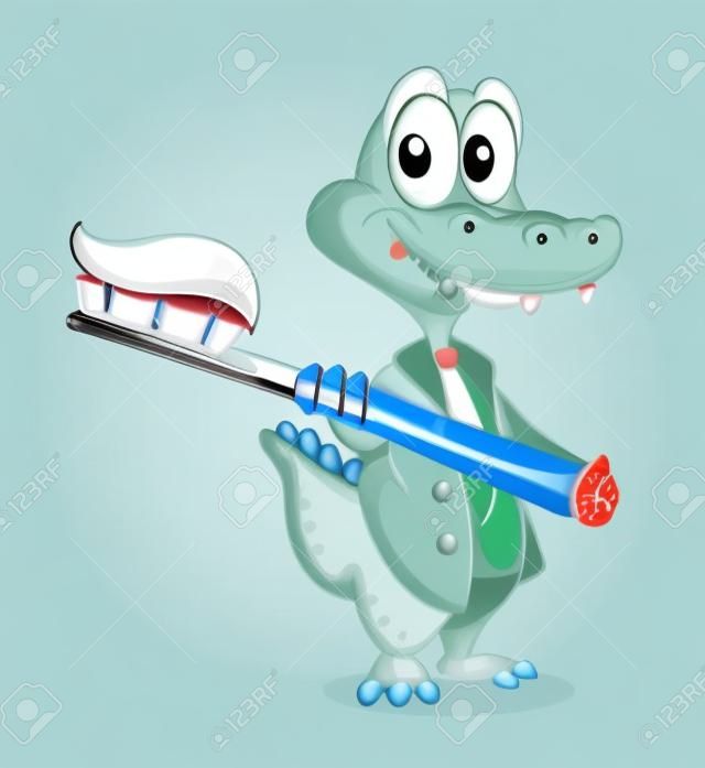 Krokodyl i szczoteczka do zębów z pasty do zębów na białym tle
