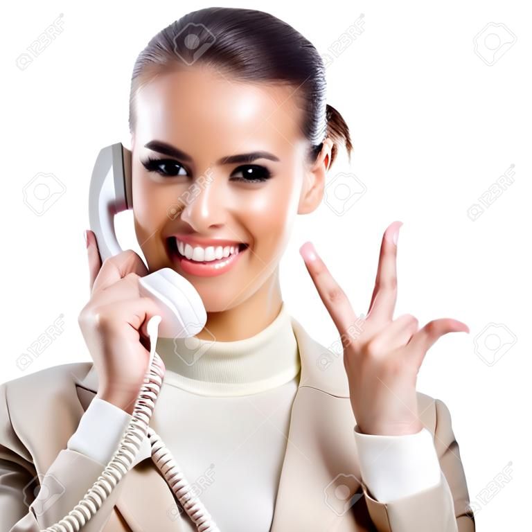 Femme d'affaires avec téléphone montrant thumbs up signe, isolé sur fond blanc