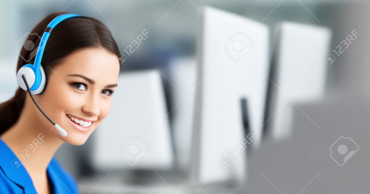 Call center help line service. Studio portrait of customer support phone sales operator in headset, blurred modern office background. Happy smiling business woman. Caller worker.