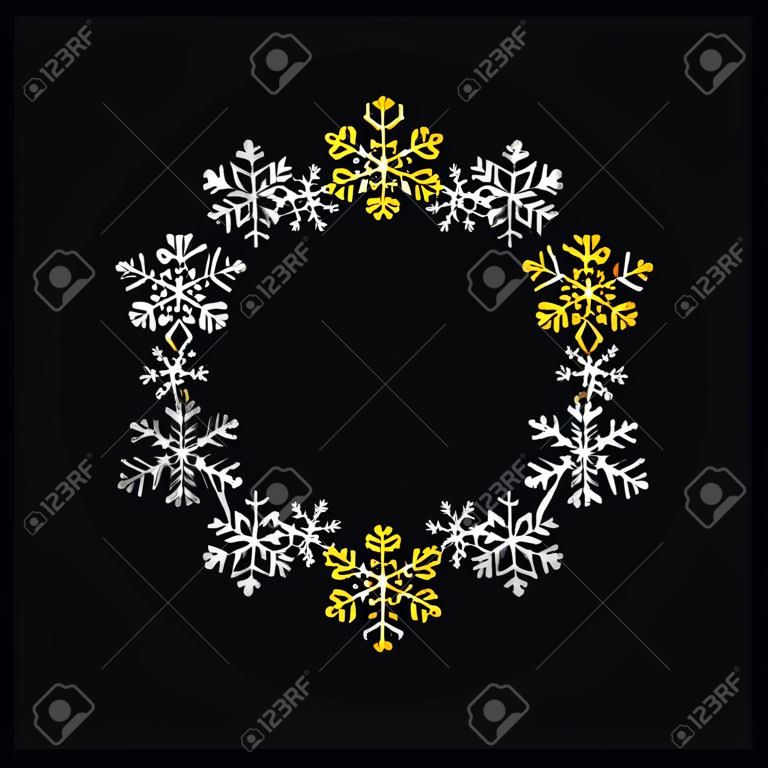wreath of decorative gold and silver snowflakes on a black background