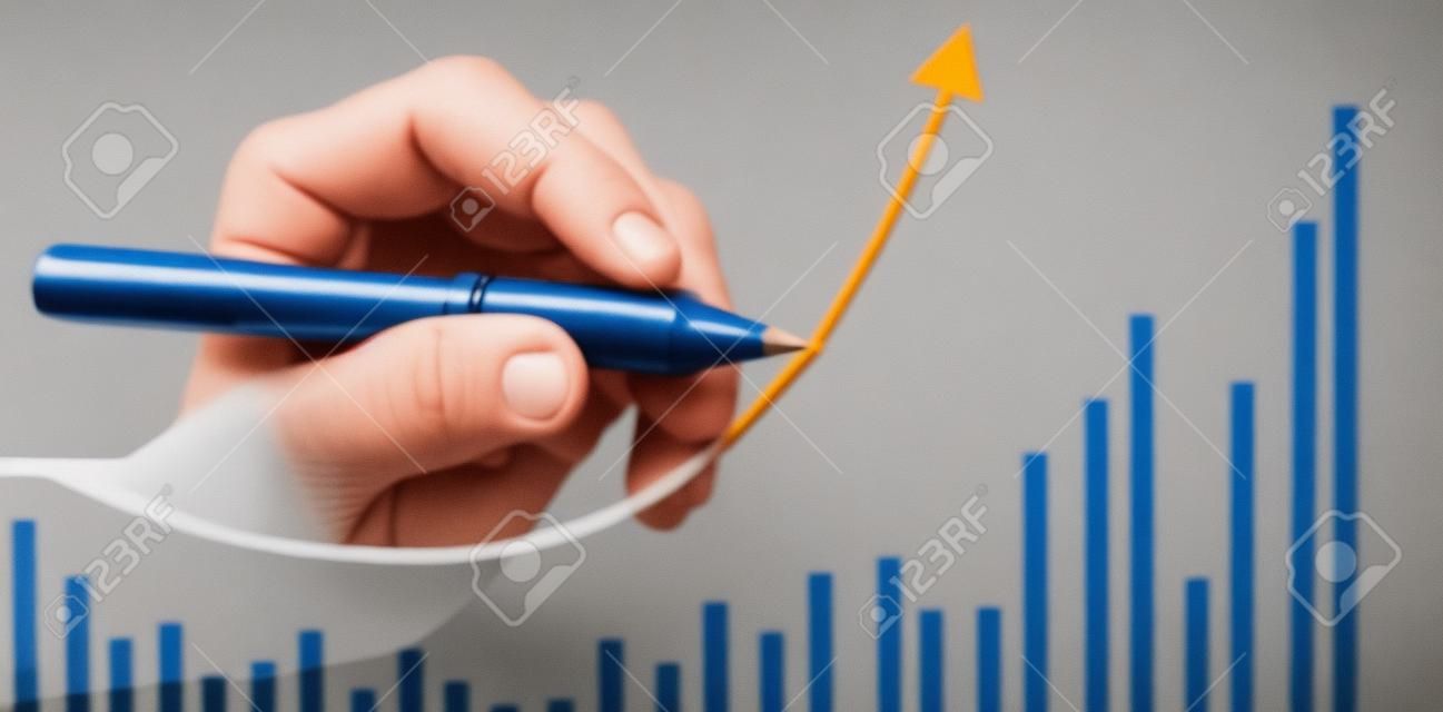 Hand drawing a chart. graph stock of growth