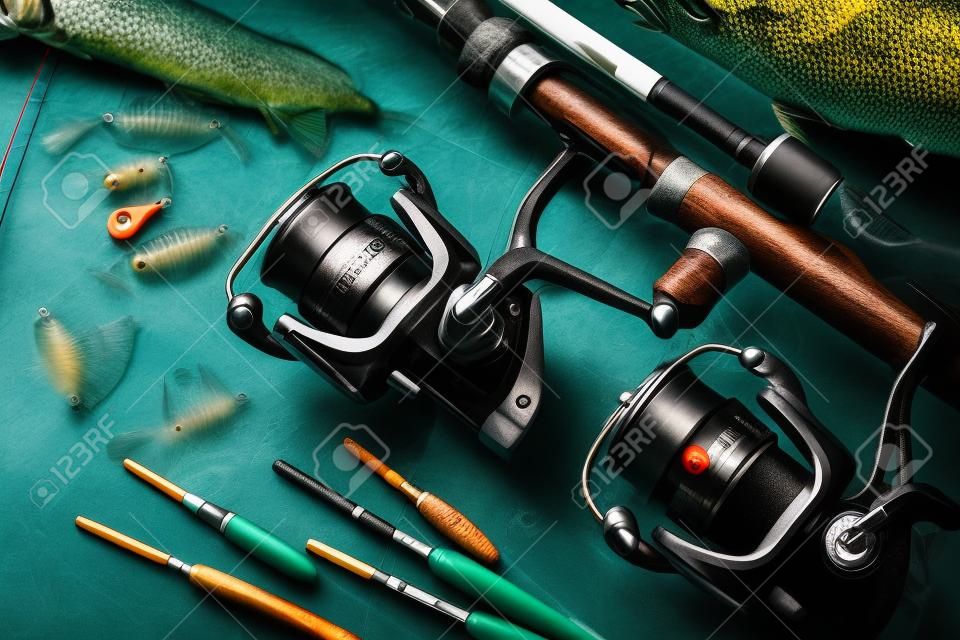 Fishing accessories in the composition on the table