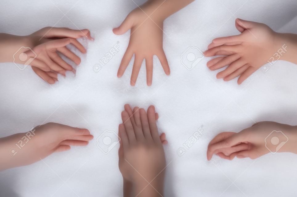 Set of female hands in foam
