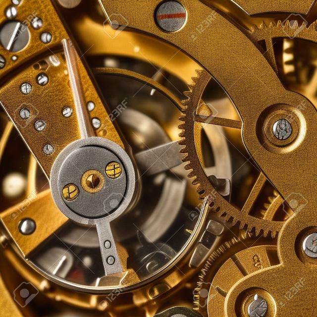 The mechanism of an old watch close-up