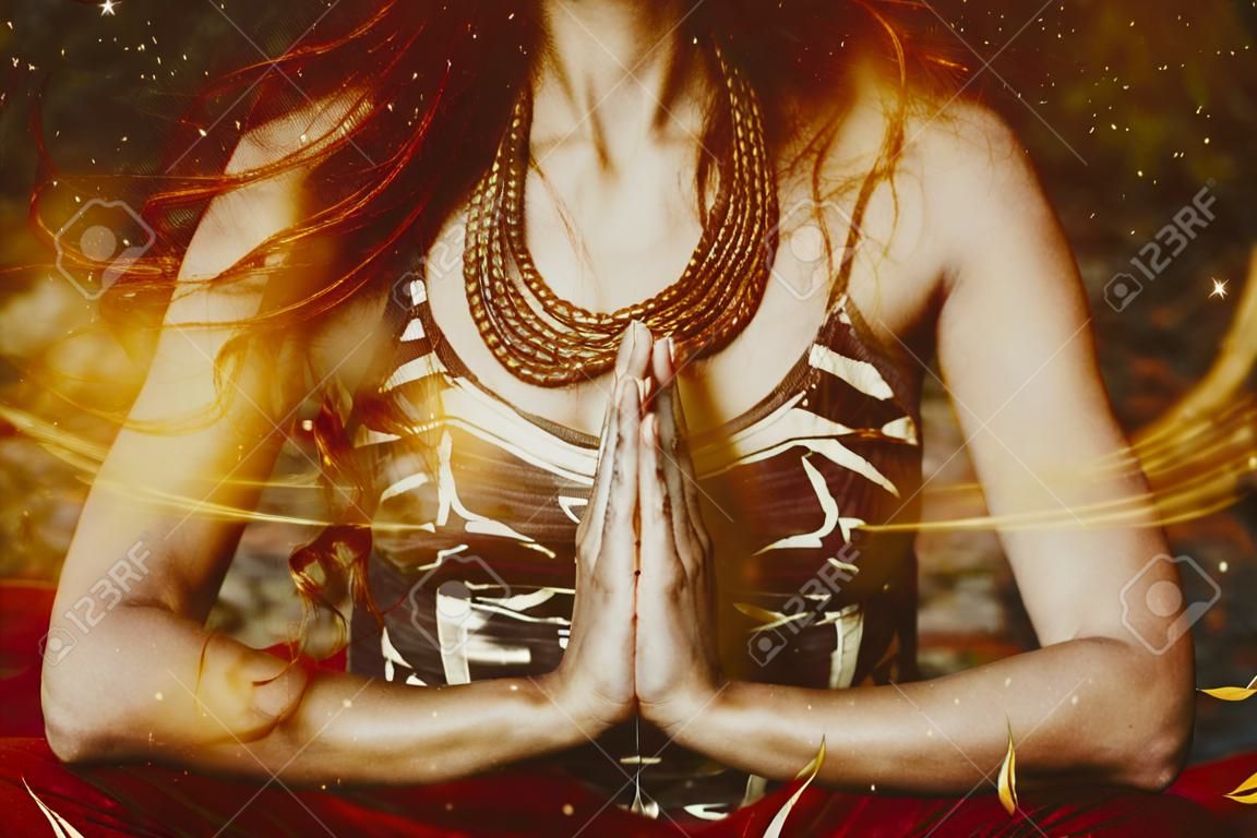 woman in yoga position  composite photo close up of hands in namaste gesture
