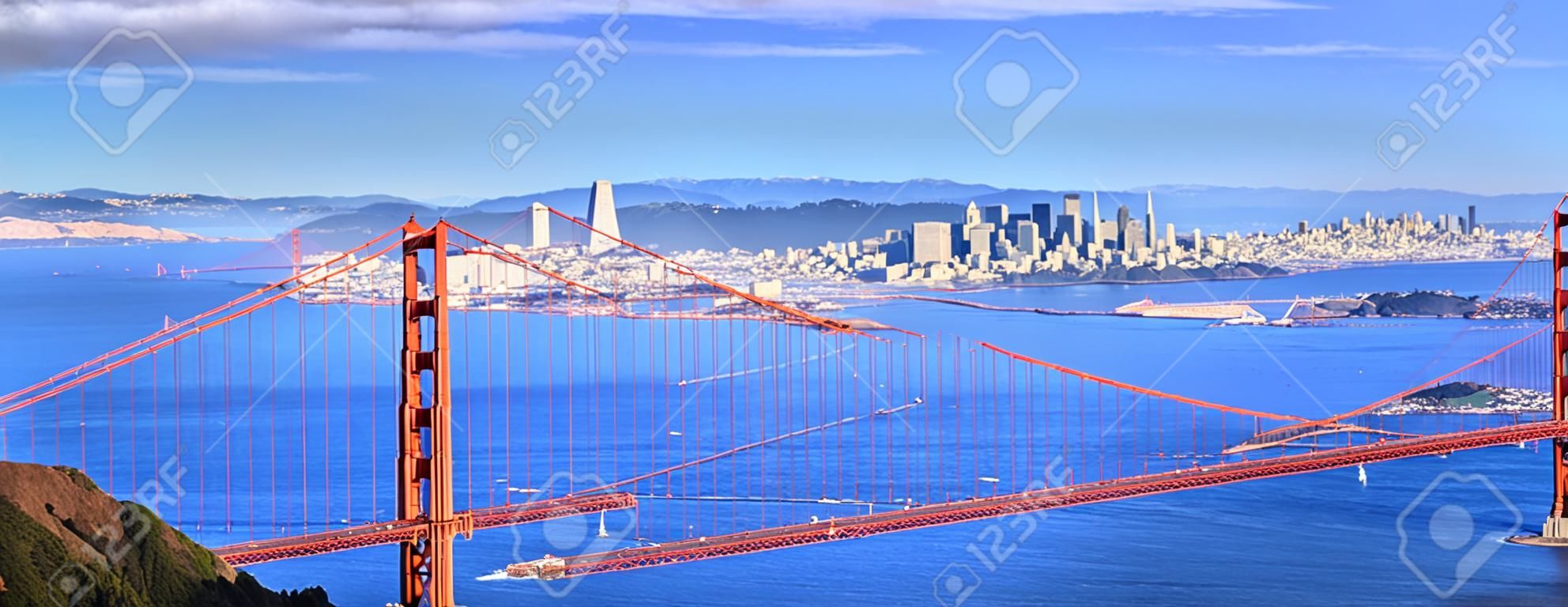 Panoramic view of famous Golden Gate Bridge and downtown San Francisco 