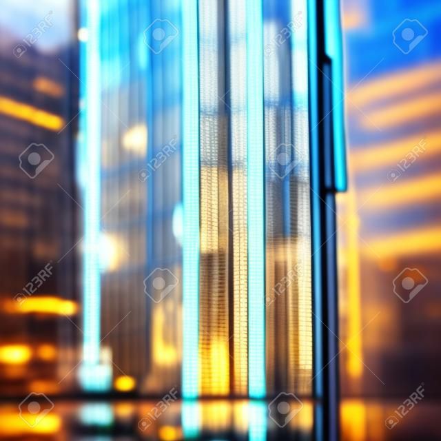 Reflection of buildings in the glass. Blurred background, bokeh.