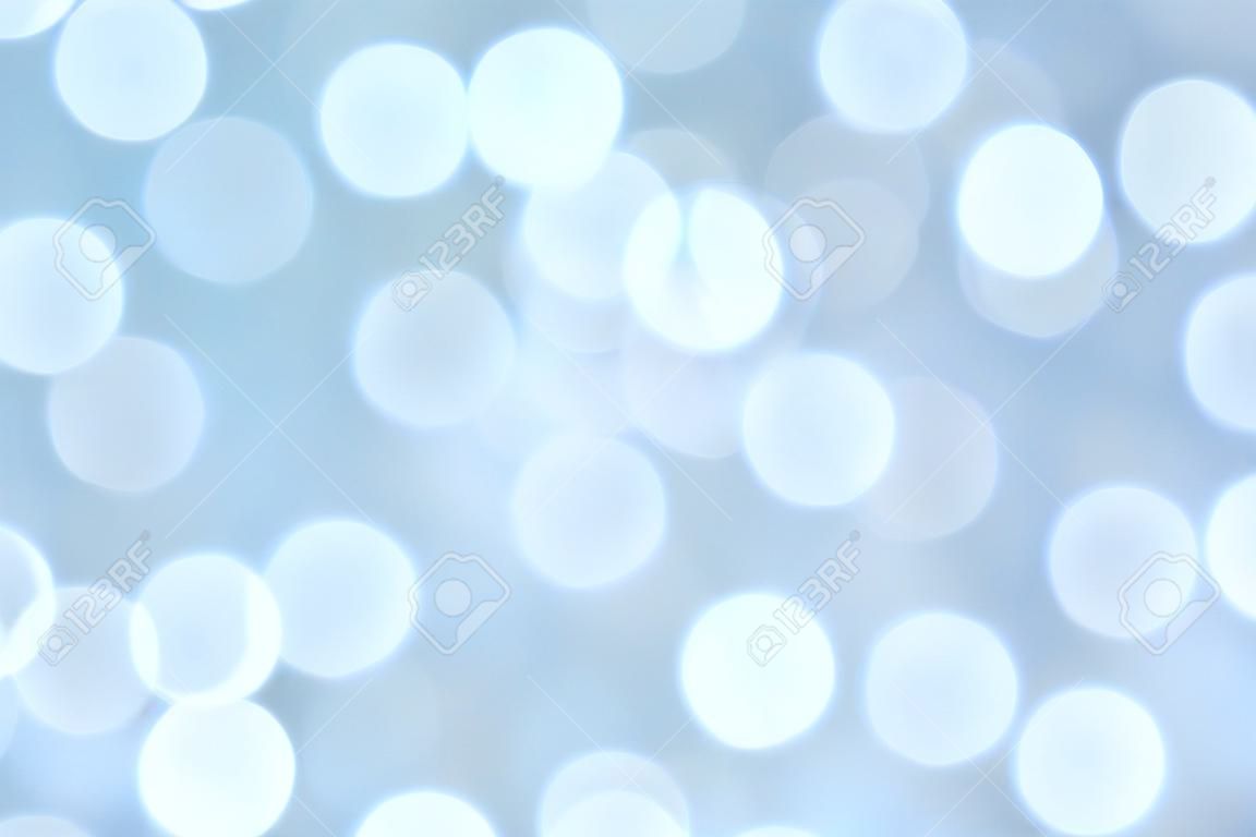 Abstract blue color blurred bokeh light / water reflection for background