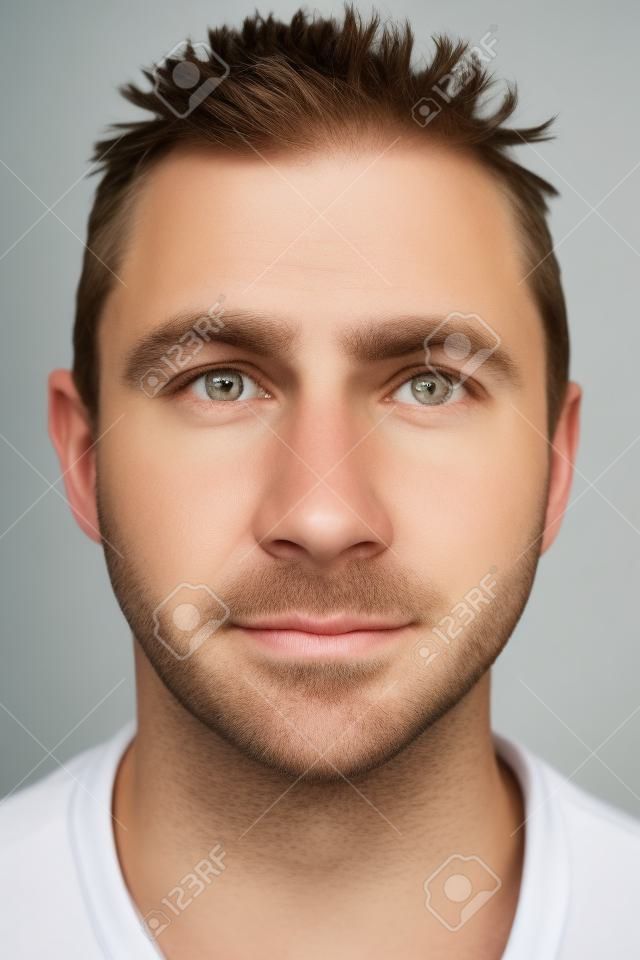Portrait of real white caucasian man with no expression ID or passport photo full collection of diverse face and expressions