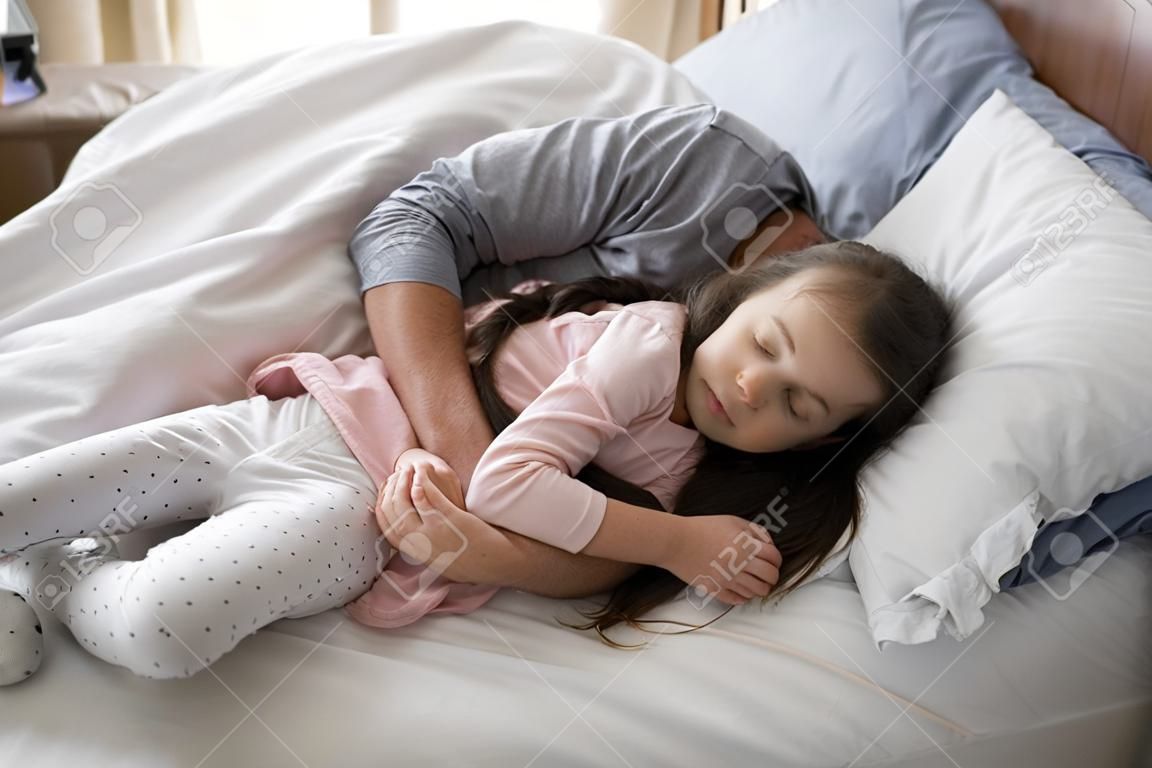 Father And Daughter Sleeping Together On Bed In Bedroom At Home Stock  Photo, Picture and Royalty Free Image. Image 83606556.