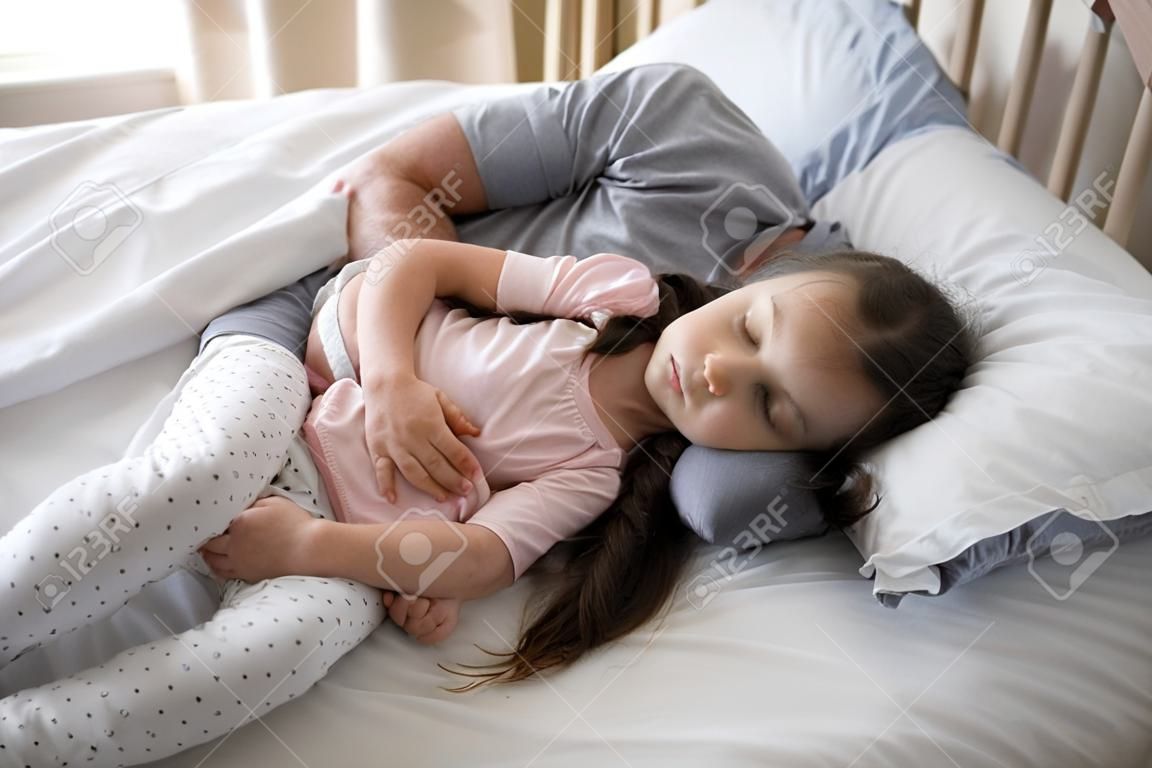 Father And Daughter Sleeping Together On Bed In Bedroom At Home Stock  Photo, Picture and Royalty Free Image. Image 83606556.