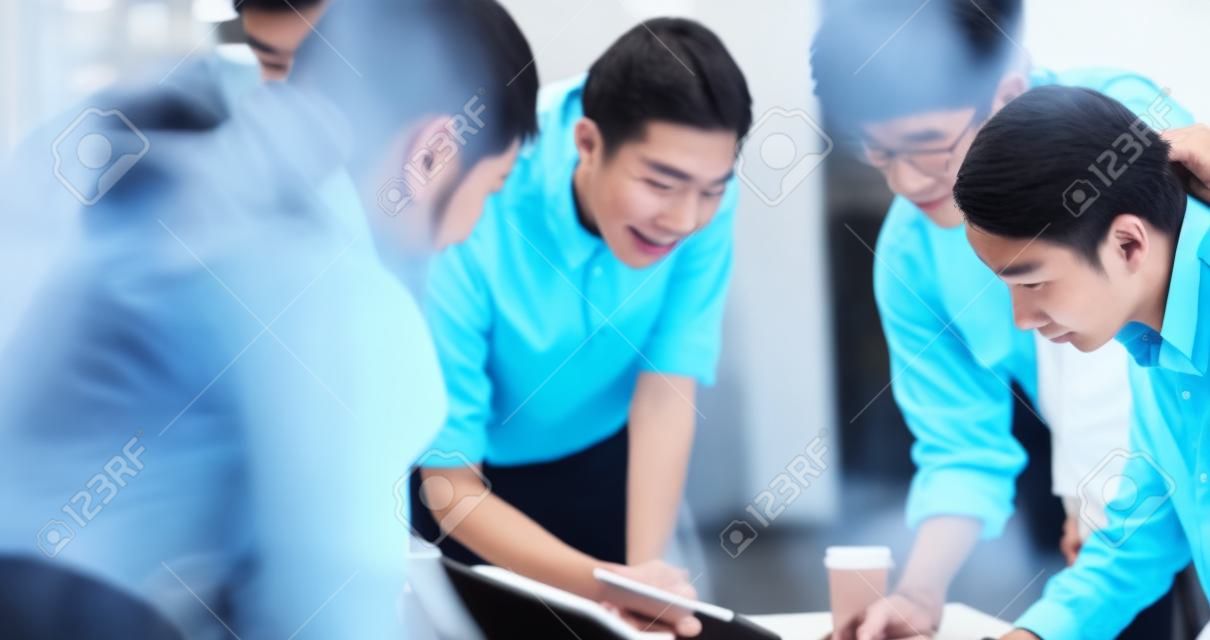 asian ux developer and ui designer brainstorming about mobile app interface wireframe design on meeting table with customer brief and color code at modern office.Creative digital development agency