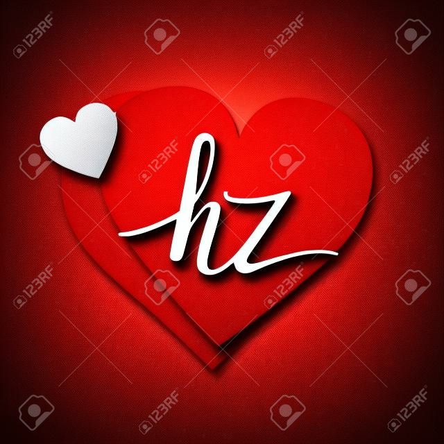 Początkowa litera logo hz z czerwonym logo w kształcie serca na zaproszenie ślubne, nazwa ślubu i nazwa firmy