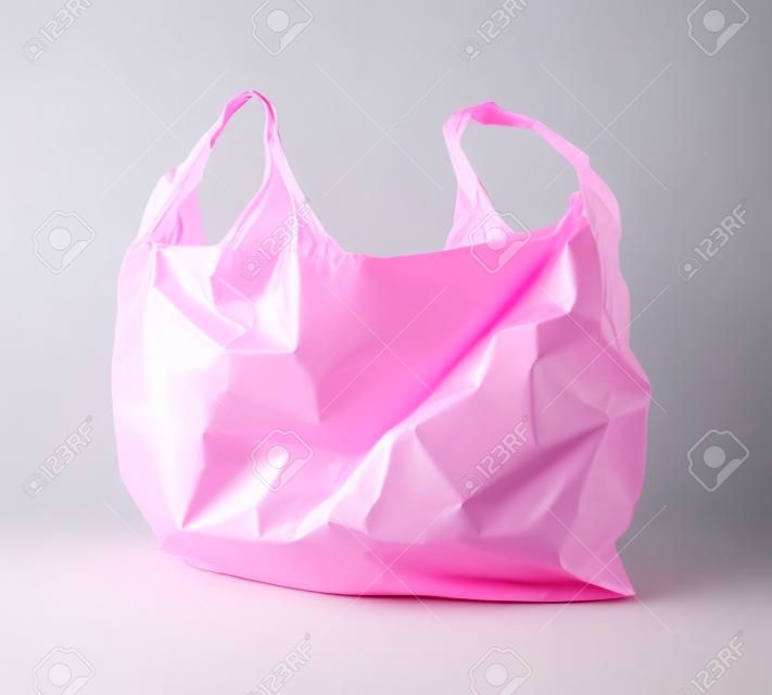 粉紅色的塑料袋在白色背景
