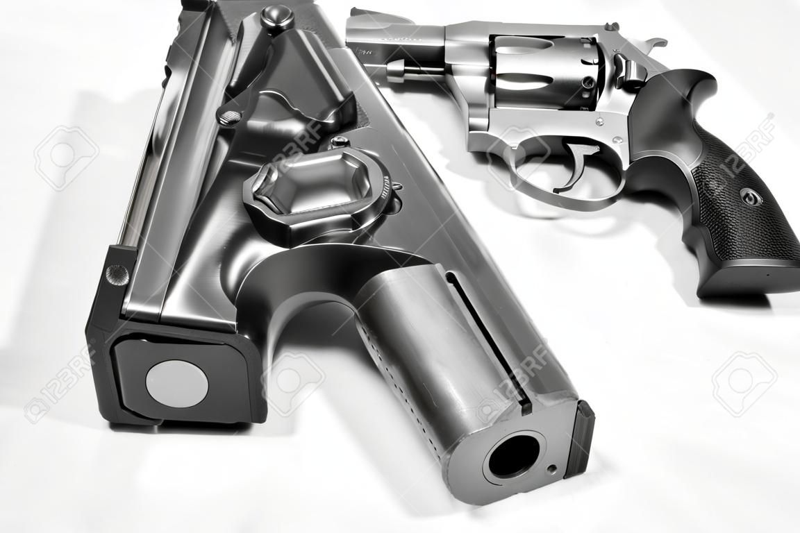 Two handguns, a 40 caliber pistol and a 357 magnum revolver shot in black and white