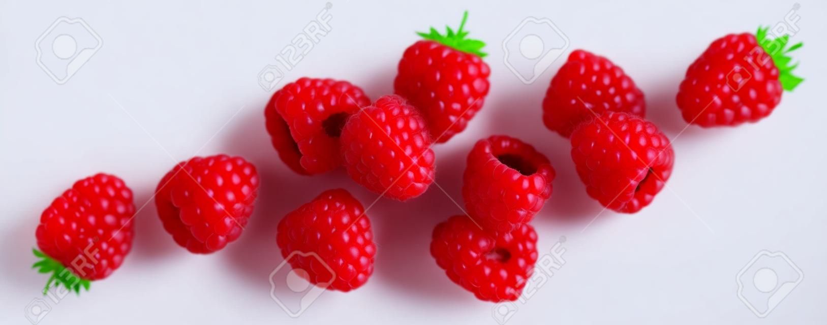 Raspberry isolated on white background, falling raspberries, collection