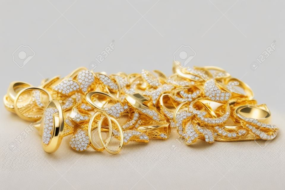 Gold jewelry on a white background