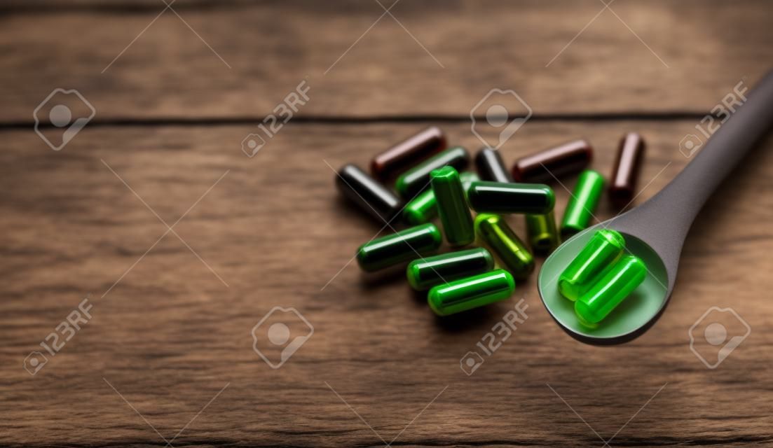 There are many herbal supplements in capsules. Selective focus. nature.