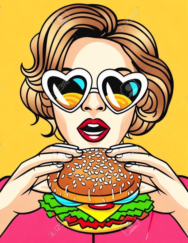 Ilustración de estilo cómico de arte pop de color vectorial de una niña comiendo una hamburguesa con queso. Mujer de negocios hermosa que sostiene una hamburguesa grande. Joven exitosa con la boca abierta muerde una hamburguesa enorme