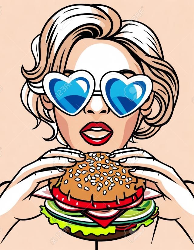 チーズバーガーを食べる少女のベクターカラーポップアートコミックスタイルイラスト。大きなハンバーガーを持つ美しいビジネスウーマン。口を開けた成功した若い女性は巨大なハンバーガーを噛む