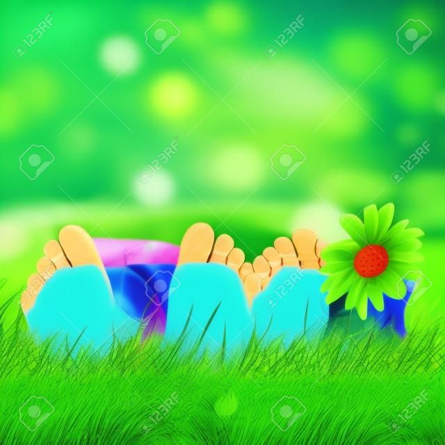 Дети, лежа на зеленой траве