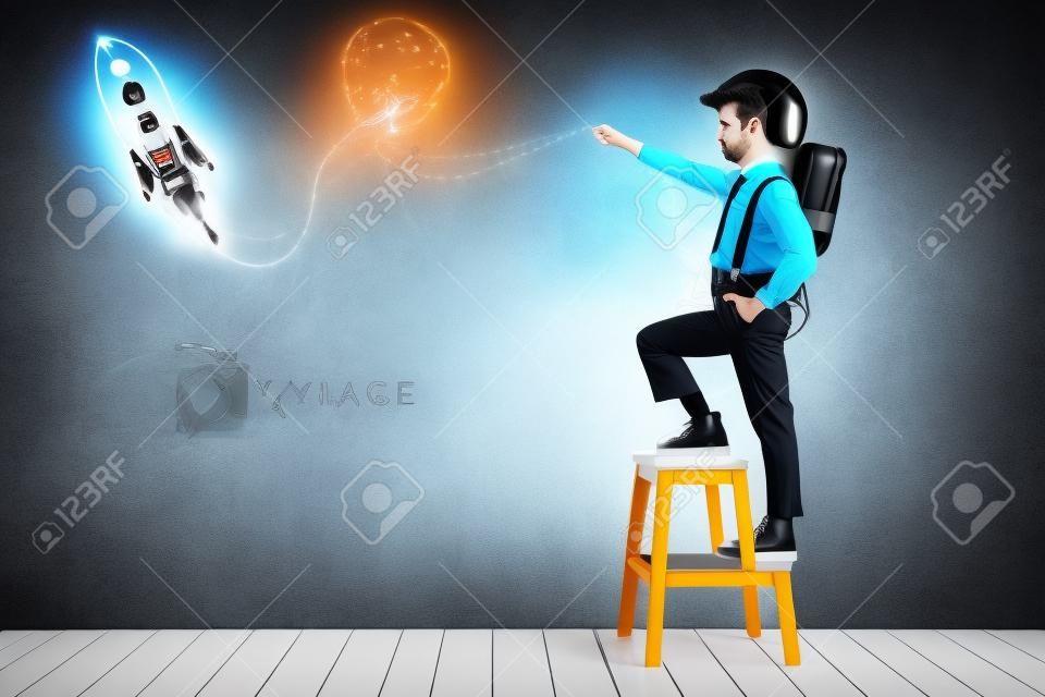 Portrait of young businessman with jet pack in office. Success, creative and innovation technology concept. Copy space for your text