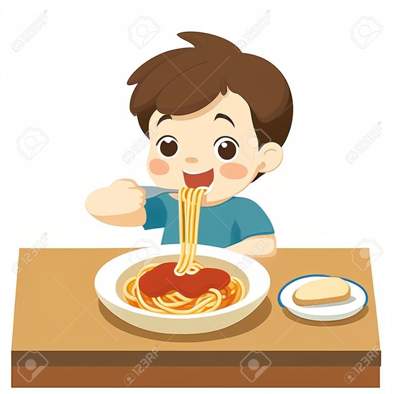皿の上のフォークでスパゲッティを食べて幸せな小さな男の子。