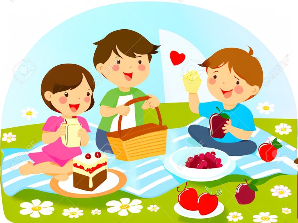 three cute kids having a picnic