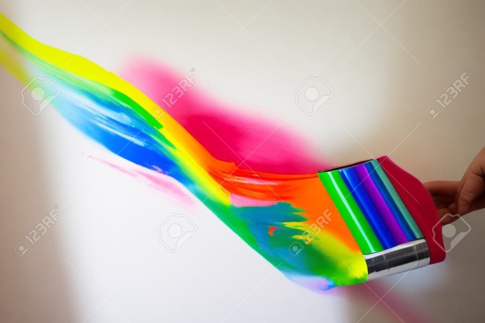 rainbow paint on the white wall