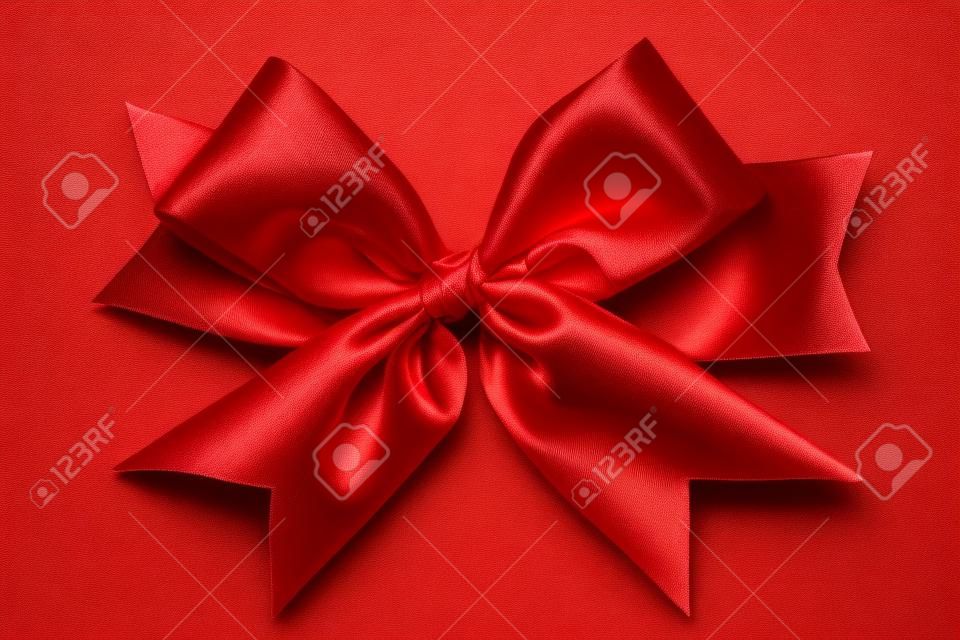 Red silk bow isolated on white background