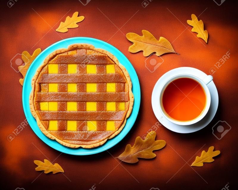 pumpkin pie with a cup of tea