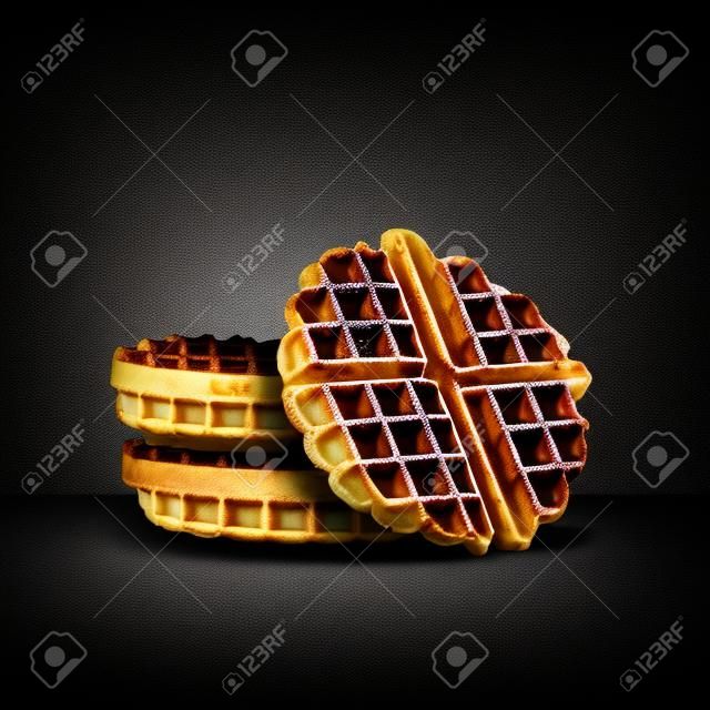 Belgian waffles on black background with copy space for your text