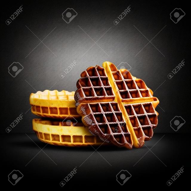 Belgian waffles on black background with copy space for your text