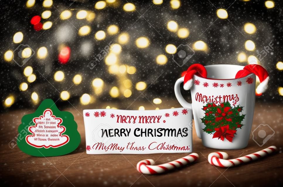 Christmas mug inscription merry Christmas on a festive blurred