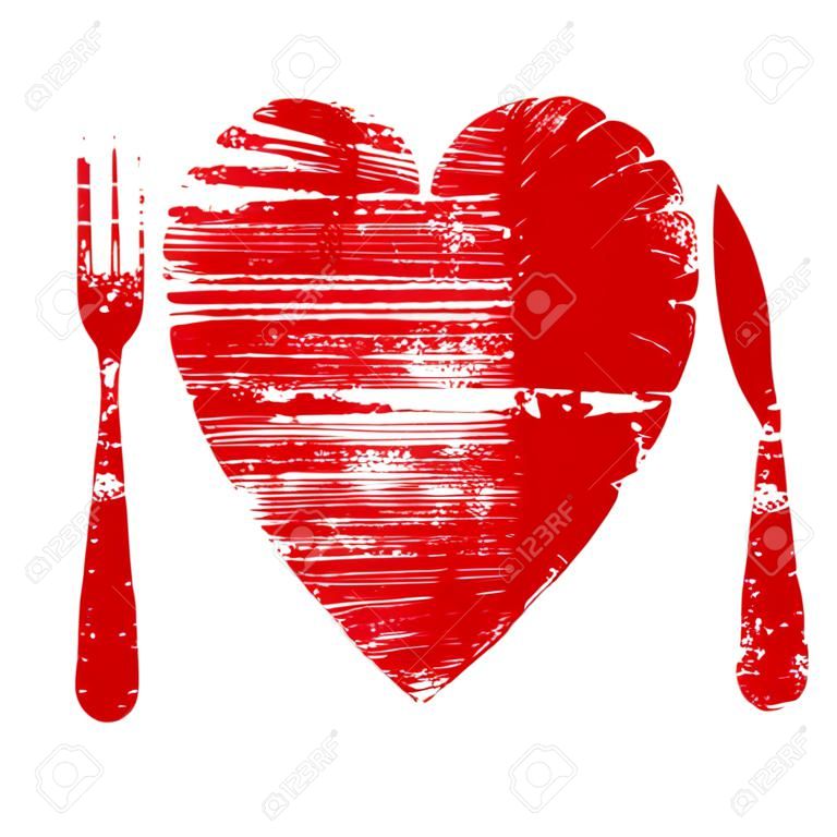 Un concetto di salute cuore - piastra di cuore rosso, coltello, cucchiaio e forchetta