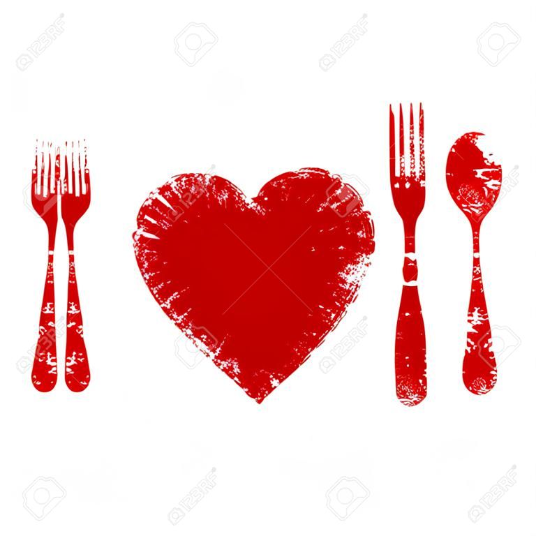 Een hart gezondheid concept - rode hart plaat, mes, lepel en vork