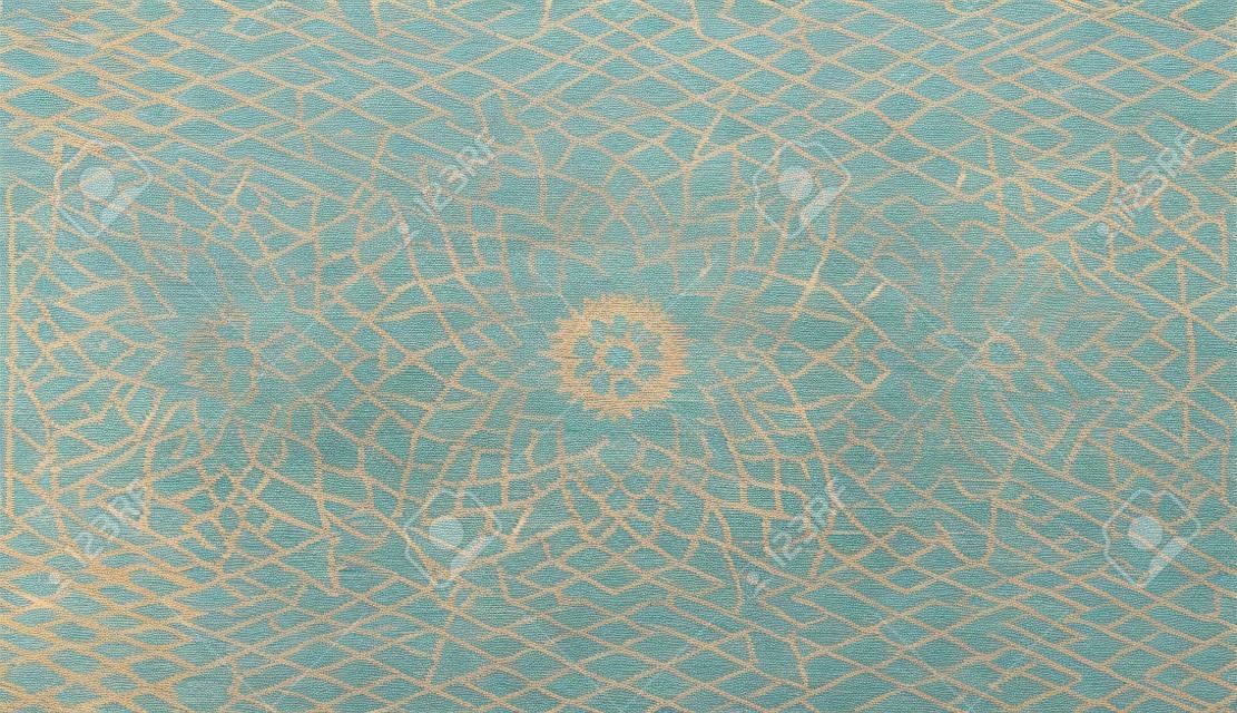 Persian Carpet Texture, abstract ornament. Round mandala pattern, Middle Eastern Traditional Carpet Fabric Texture. Turquoise milky blue grey brown yellow colored
