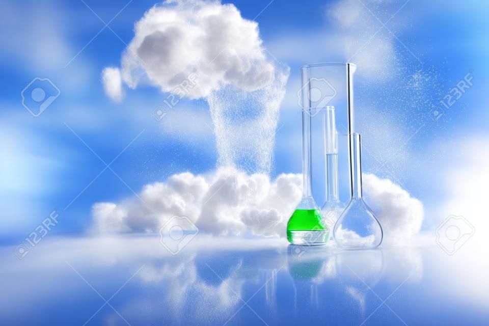 Pharmacy and chemistry theme. Test glass flask with solution in research laboratory. Science and medical background. Laboratory test tubes on abstract explosion cloud background. Selective focus
