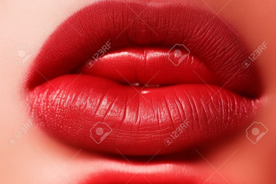 Plump  beautiful  girl lips  isolated  on white background close up